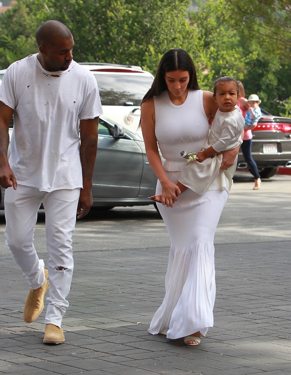Manželé Kim Kardashian a Kanye West s dcerou North.