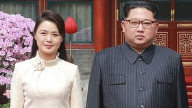 Kim Čong-un s manželkou během návštěvy Číny