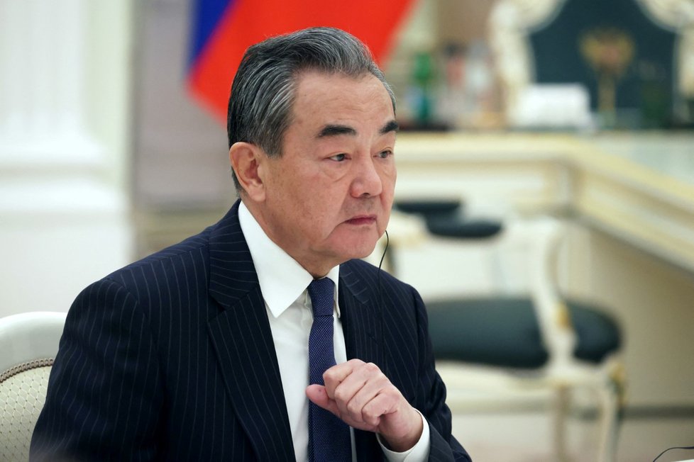 Šéf čínské diplomacie Wang I u Vladimira Putina (22. 2. 2023).