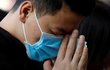 Obavy ze šíření koronaviru: Modlitba s rouškou ve Vietnamu (30.1.2020)