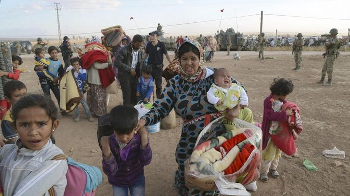 Kurdští uprchlíci na turecko-syrské hranici