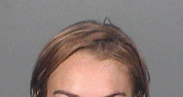 Policejní foto Lindsay vzniklo těsně po zatčení