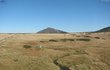 Luční bouda před týdnem - Turisté si vykračují pod modrým nebem. Teplota je 15 °C.