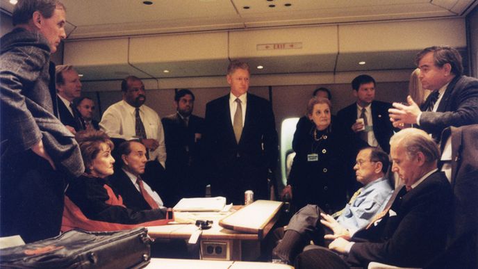 Bill Clinton and officials on Air Force One