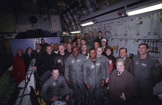 U.S. delegation pose for a group photo with Air Force personnel during the flight to Tuzla, Bosnia - Flickr - The Central Intelligence Agency