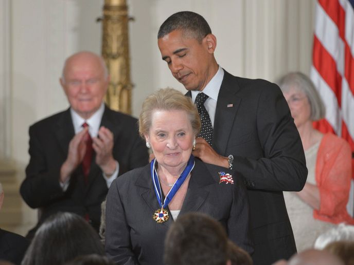 US President Barack Obama presents the Presidential Medal of Freedom to former secretary of state Madeleine Albright during a ceremony on May 29, 2012