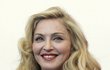 U.S. pop star Madonna, director of the movie "W.E" poses during a photocall at the 68th Venice Film Festival September 1, 2011. REUTERS/Alessandro Garofalo (ITALY - Tags: ENTERTAINMENT)