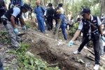 V Malajsii našla policie hromadné hroby.