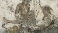 Antické nástěnné erotické malby na stěně pompejského nevěstince