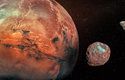 Měsíce Phobos a Deimos obíhají okolo rudé planety Mars 