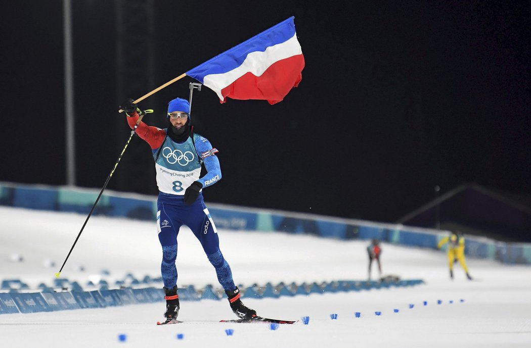 Martin Fourcade slaví zlatou medaili