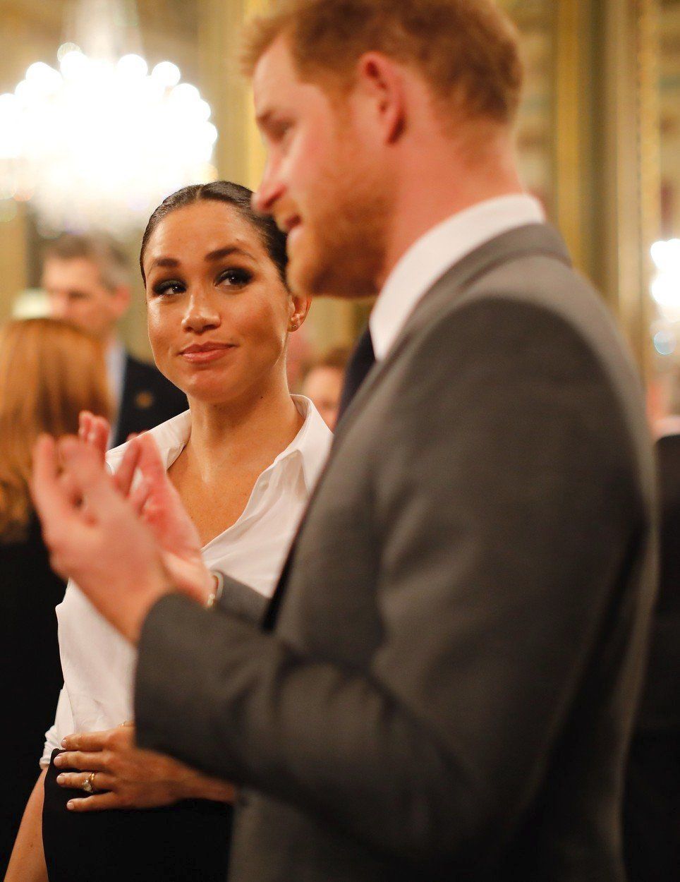 Meghan zářila na předávání cen válečným veteránům v černobílé kombinaci.