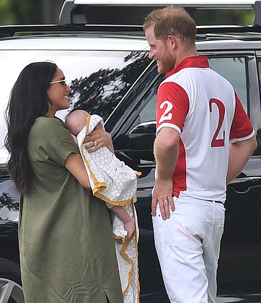 Vévodkyně Meghan se synem a princem Harrym.