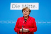 Merkelová - jak jinak - počtvrté kancléřkou. Ale hlasování bylo těsnější než mělo