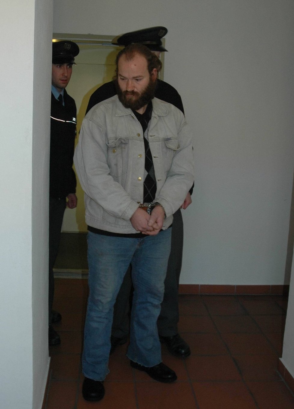 Vrah Semanský po zadržení v lednu 2012.