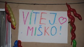 Vítající transparenty na oslavu Michalky návratu z Německa do Čech