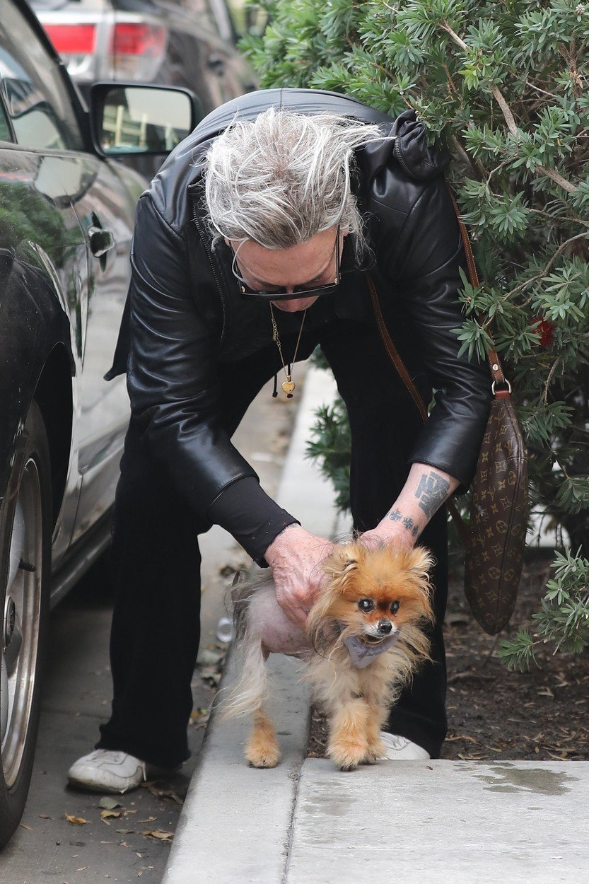 Mickey Rourke a jeho pomerian Chewie