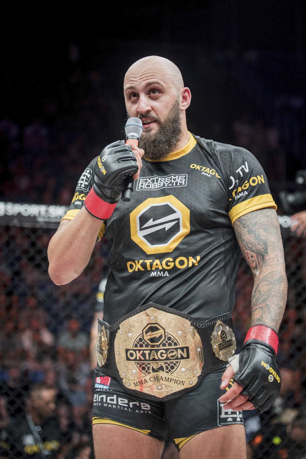 Michal Martínek s pásem šampiona OKTAGON MMA