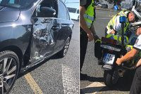 Policejní motorku položil na bok! Muž zákona vrazil na Proseku do auta, zraněný skončil v nemocnici