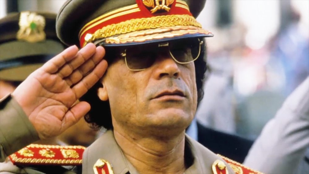 Legendární byly například i Kaddáfího jeho outfity