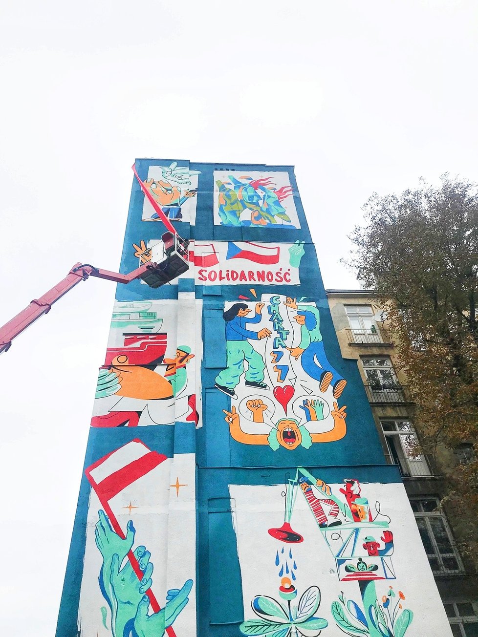 Odhalení nástěnného muralu ve Varšavě při příležitosti 40. výročí vzniku polského hnutí Solidarita. Umělecké dílo vzniklo jako společný projekt osmi českých a polských umělců. Výsledkem jsou dva nástěnné muraly, které se odhalily ve stejnou chvíli v Praze a ve Varšavě.