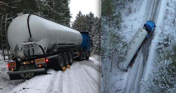 Kamion u Hostomic projel dva zákazy a skončil mimo cestu: Ledovka bránila i jeho vyproštění