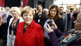 Kampaň Angely Merkelové provázejí vyjádření podpory i odporu.