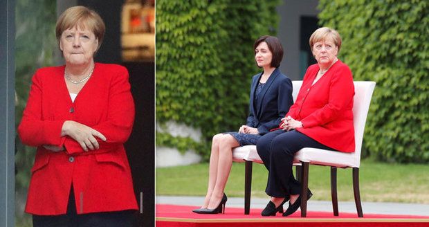 Merkelová si na hymnu opět sedla. Třesu se bránila i založenýma rukama