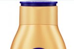 Zpevňující tónovací tělové mléko Q10 Firming + bronze, Nivea, 259 Kč (400 ml)
