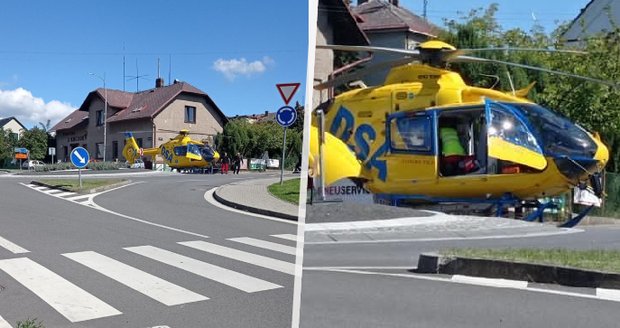 Neukáznění řidiči komplikují práci záchranářům: Auto projelo přímo pod přistávajícím vrtulníkem.