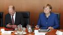 Německý ministr financí Olaf Scholz (SPD) s kancléřkou Angelou Merkelovou (CDU)
