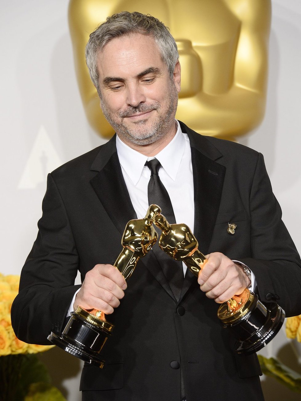 Alfonso Cuaron přebral sošky Oscara za režii filmu Gravitace