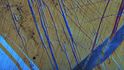 Fotografie zachycuje postupnou změnu                                                                                                                                                                                                                                                                                                                   z martensitu (modrý) do austenitu (hnědý) 3/3
