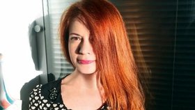 Zabitá novinářka Oxana Baulinová