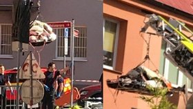 Obézního pacienta z bytu vyndávali oknem: 336 kg vážícího muže stěhoval jeřáb