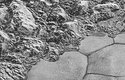 Planina Pluita na Plutu je pokrytá ledem a zabírá rozlohu 1050 × 800 km