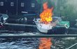 U Podolského nábřeží v Praze hořela v sobotu večer motorová loď. (23. května 2021)