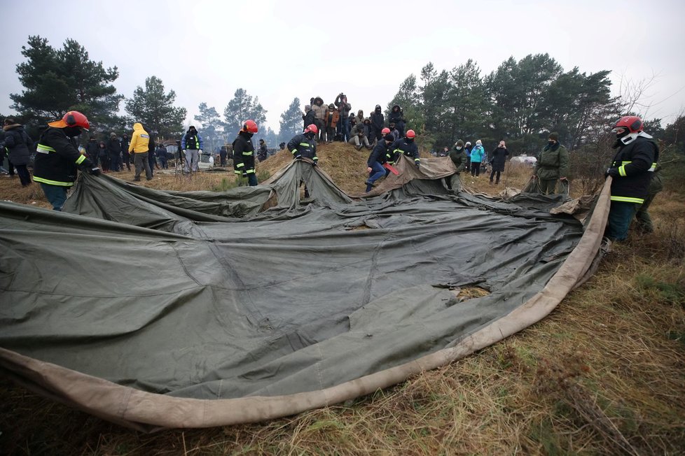 Migranti z Blízkého východu na polsko-běloruské hranici (14. 11. 2021)