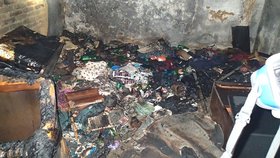 Dva mrtví po požáru v Chebu: Plameny udělaly z malé garáže peklo na zemi