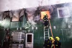 Požár stavebních buněk v Šeberově. (15. prosince 2022)