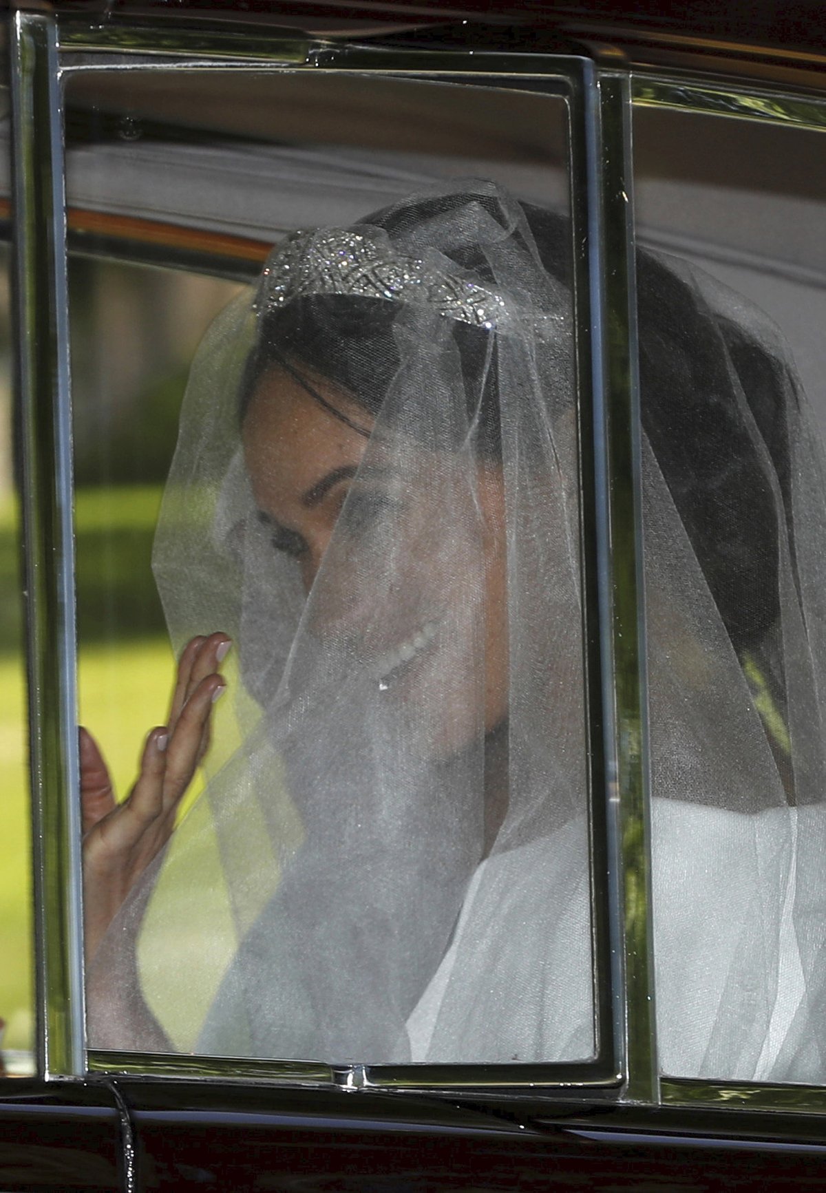 Meghan Markle přijíždí na hrad Windsor.