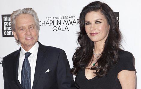 Michael Douglas (L) and Catherine Zeta-Jones attend the 40th Anniversary Chaplin Award Gala at Lincoln Center in New York in this file photo taken April 22, 2013.  Douglas and Zeta-Jones, both Oscar winners and among Hollywood&#39;s most high-profile couples, have separated in what could spell the end of their nearly 13-year marriage, People magazine reported on Wednesday.  REUTERS/Andrew Kelly/Files   (UNITED STATES - Tags: ENTERTAINMENT)