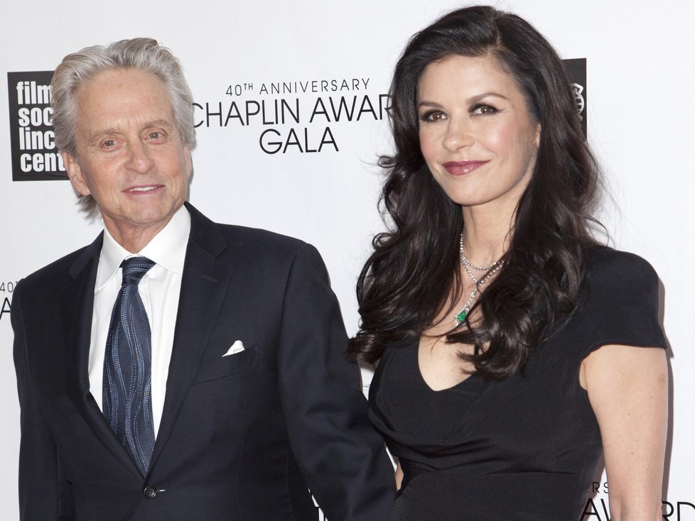 Michael Douglas (L) and Catherine Zeta-Jones attend the 40th Anniversary Chaplin Award Gala at Lincoln Center in New York in this file photo taken April 22, 2013.  Douglas and Zeta-Jones, both Oscar winners and among Hollywood&#39;s most high-profile couples, have separated in what could spell the end of their nearly 13-year marriage, People magazine reported on Wednesday.  REUTERS/Andrew Kelly/Files   (UNITED STATES - Tags: ENTERTAINMENT)