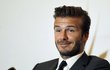 Former England soccer captain David Beckham smiles during a news conference in Shanghai June 20, 2013. Beckham arrived in China on Monday to start his second trip as China&#39;s soccer envoy. REUTERS/Aly Song  (CHINA - Tags: SPORT HEADSHOT PROFILE ENTERTAINMENT SOCCER)