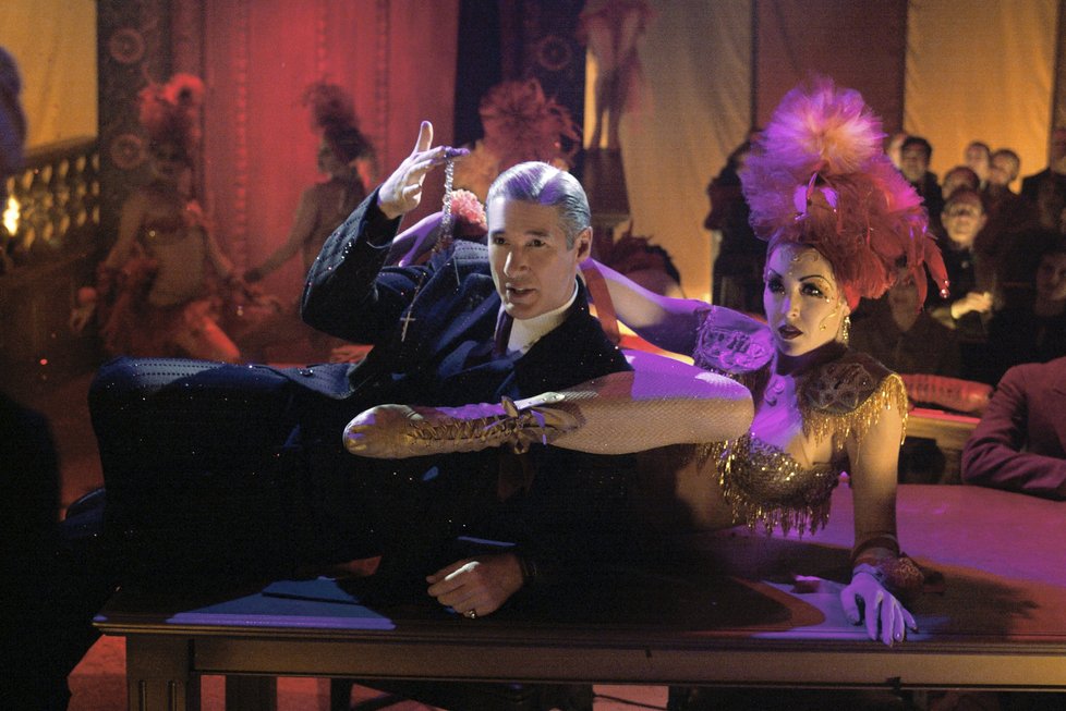 Chicago, 2002 - Jako zpívající advokát Billy Flynn Richard Gere se nesmazatelně zapsal v oscarovém muzikálovém filmu Chicago.