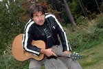 Kapelník a zpěvák Kamelotu Roman Horký (45) letí v neděli s kytarou za českými vojáky do zahraničí