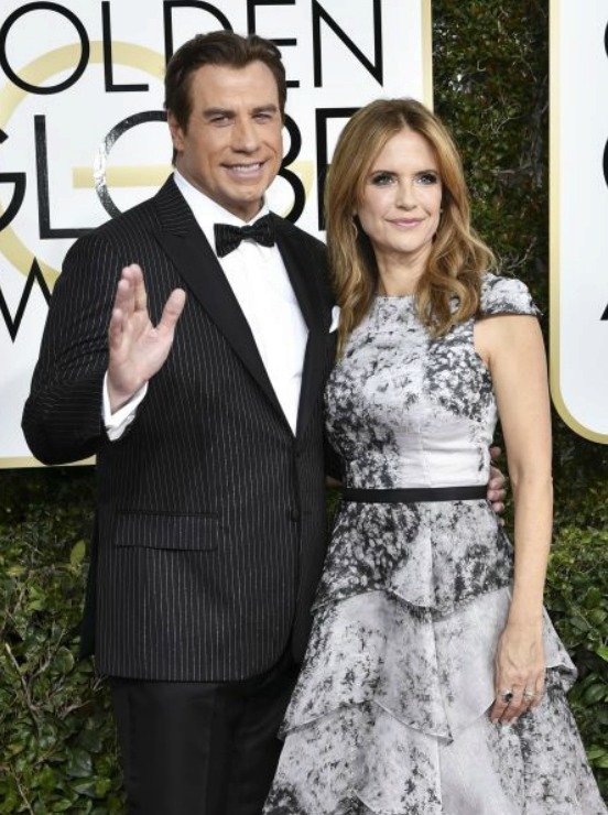 John Travolta (63) a Kelly Preston (55)