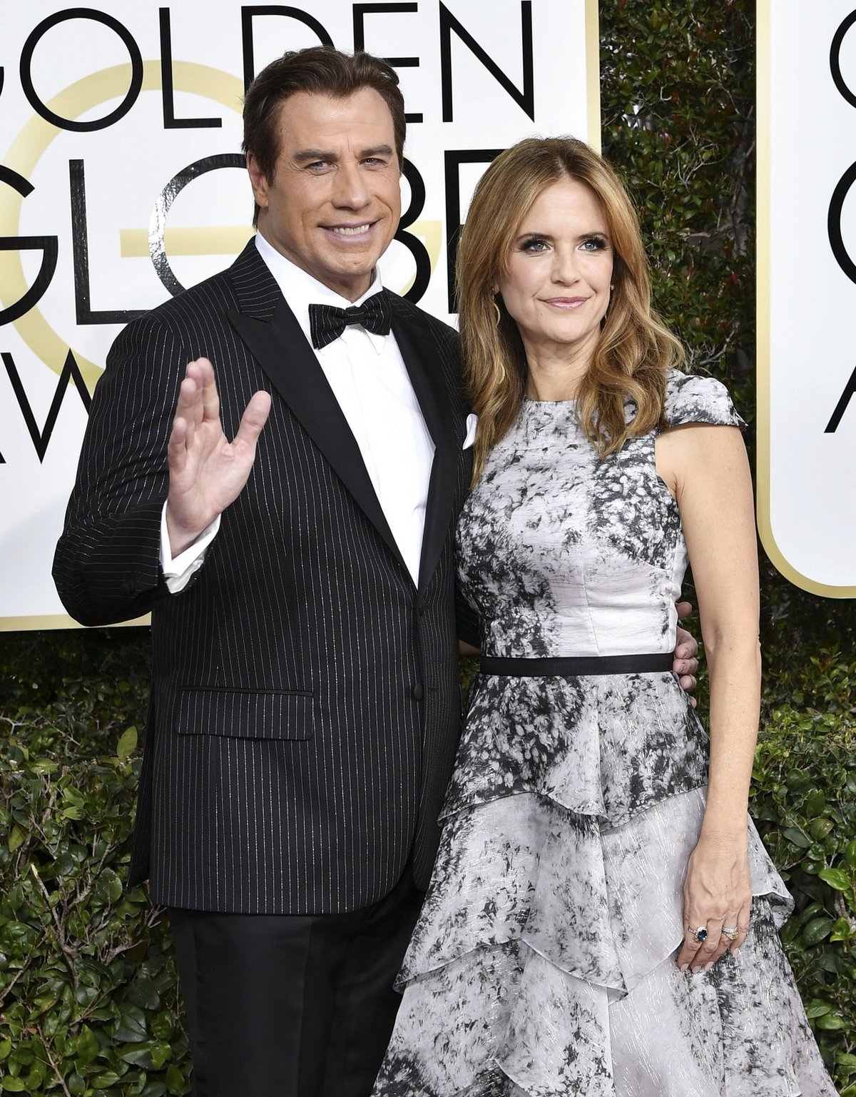 John Travolta (63) a Kelly Preston (55)