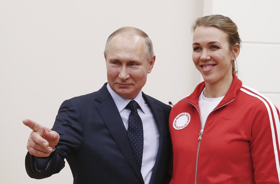 Prezident Vladimir Putin a ruští sportovci.