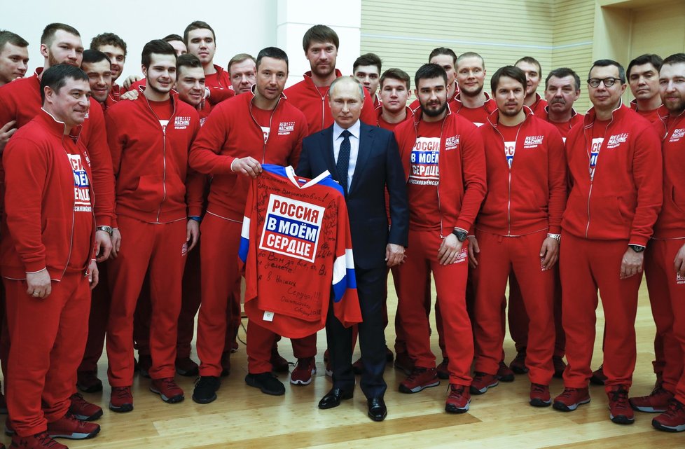 Prezident Vladimir Putin a ruští sportovci.